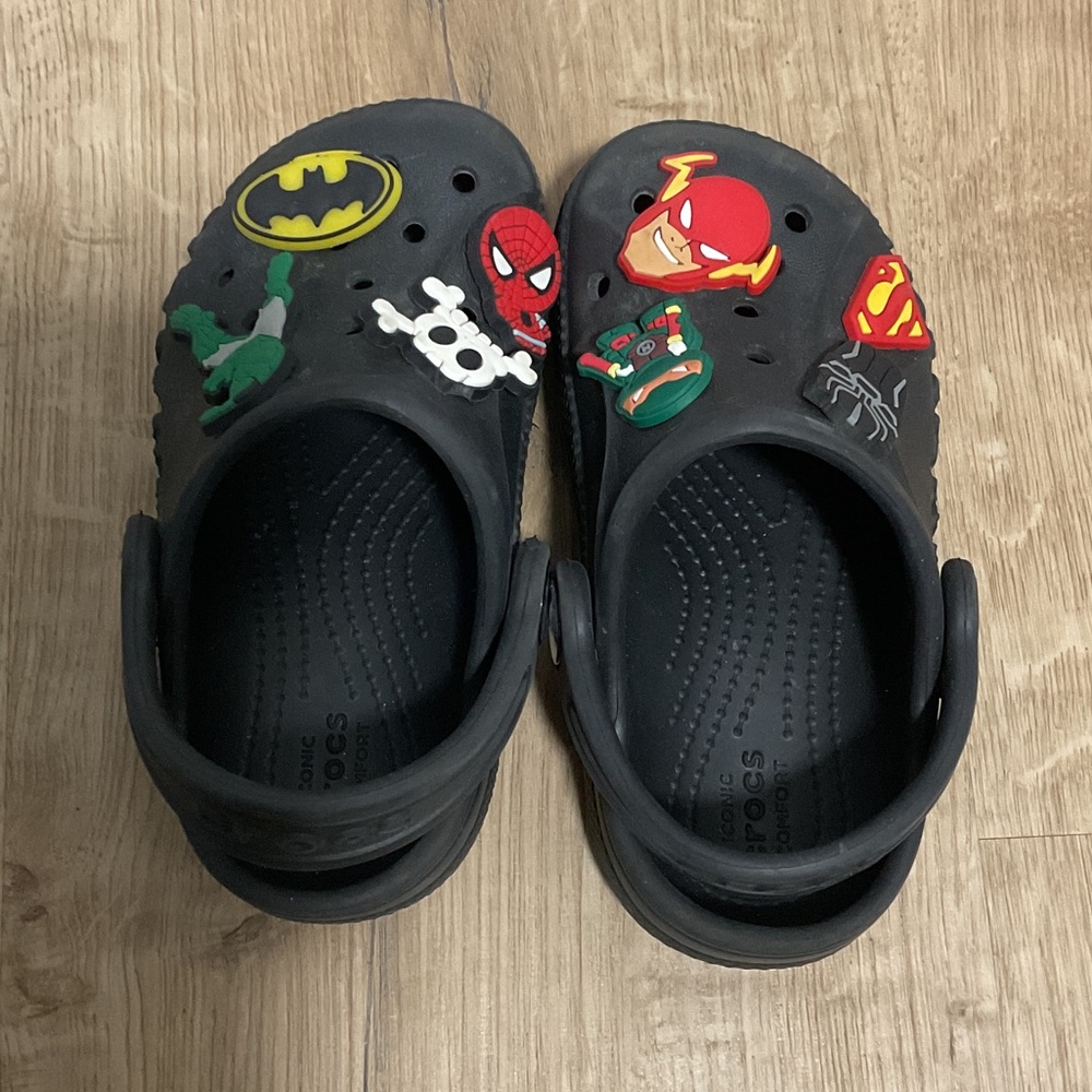 CROCS Black Clogs with Hero Charms
